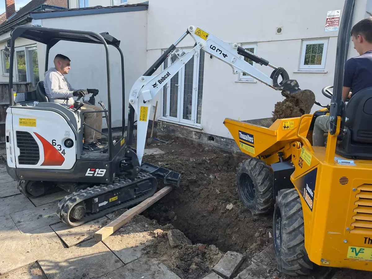 Mini excavator digging a garden room base in Oxford